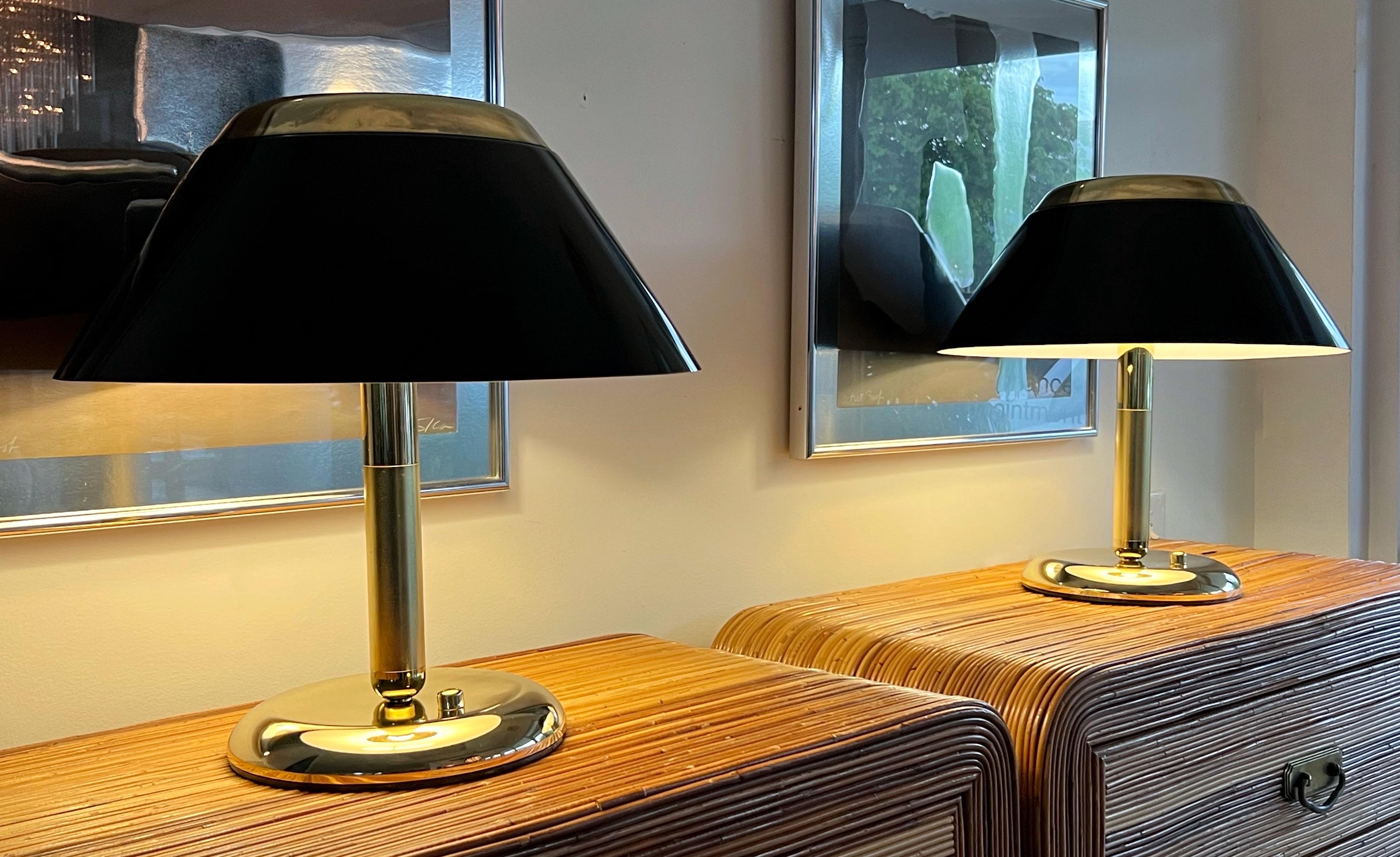 Beautiful pair of lamps. The shades are black lucite. Dimmer switch. 