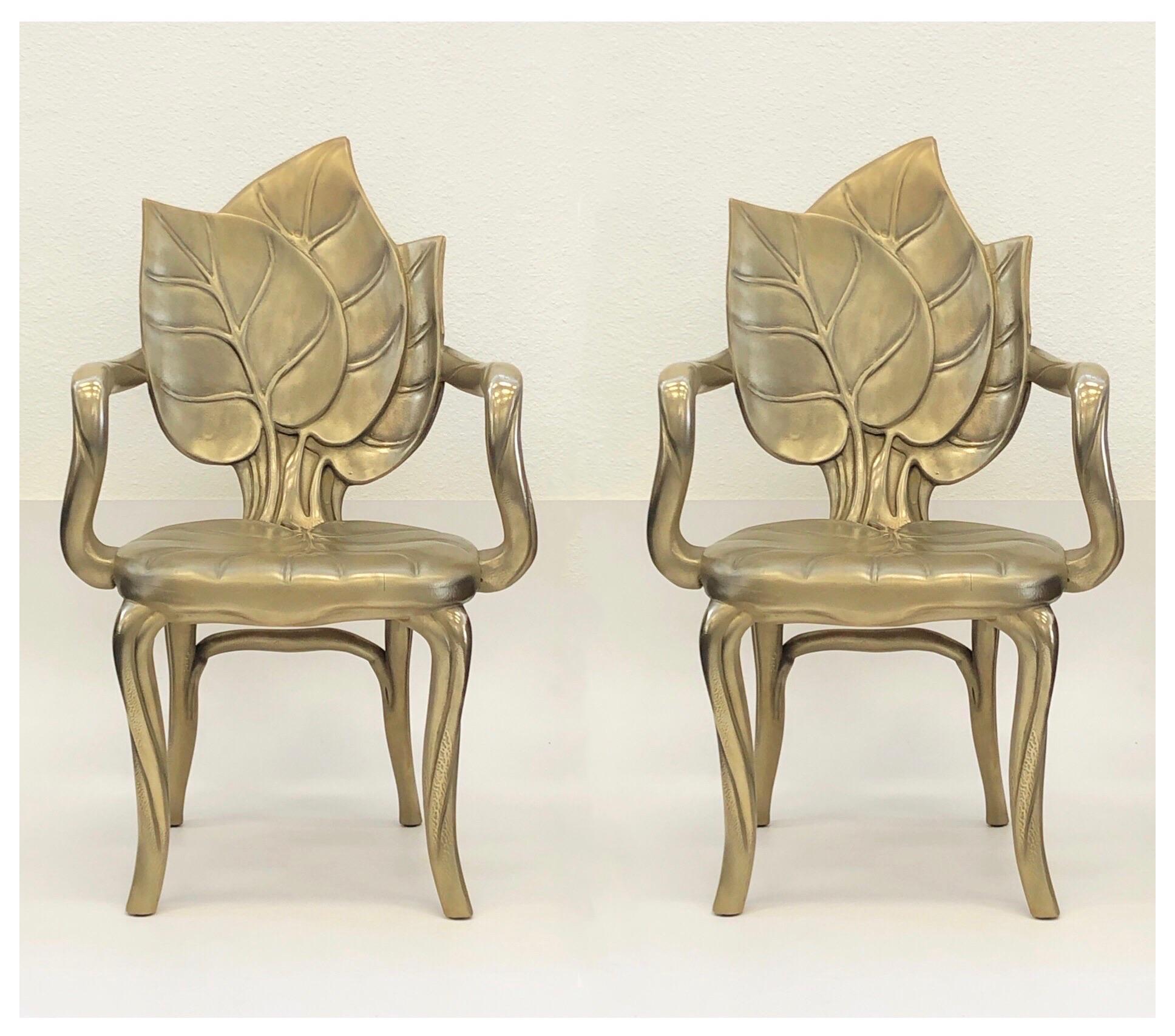 A pair of spectacular hand carved wooden leaf armchairs design by Bartolozzi and Maioli in the 1970s.
The chairs are sprayed powder brass with only some areas polished.
Measurements: 22.25” wide 21” deep 25.25” arm height 17” seat height 36.5”