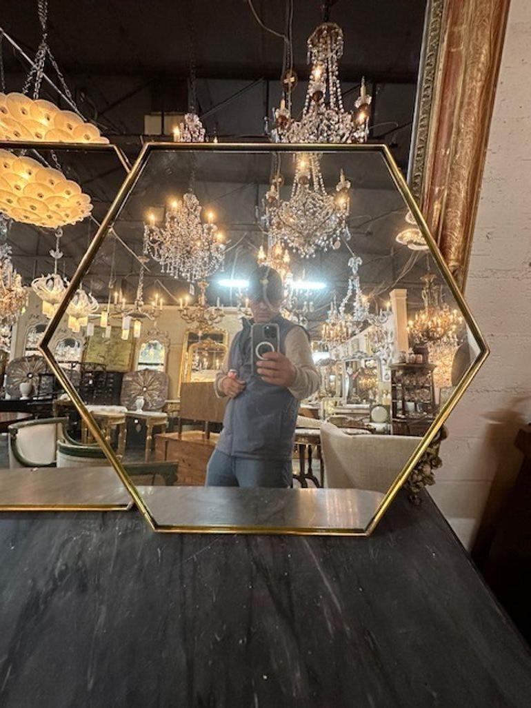 Pair of Italian brass frame hex mirrors. Circa 2000. Sure to make a statement!