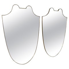 Pair of Italian Brass Framed Shield Form Wall Mirrors, 1950s