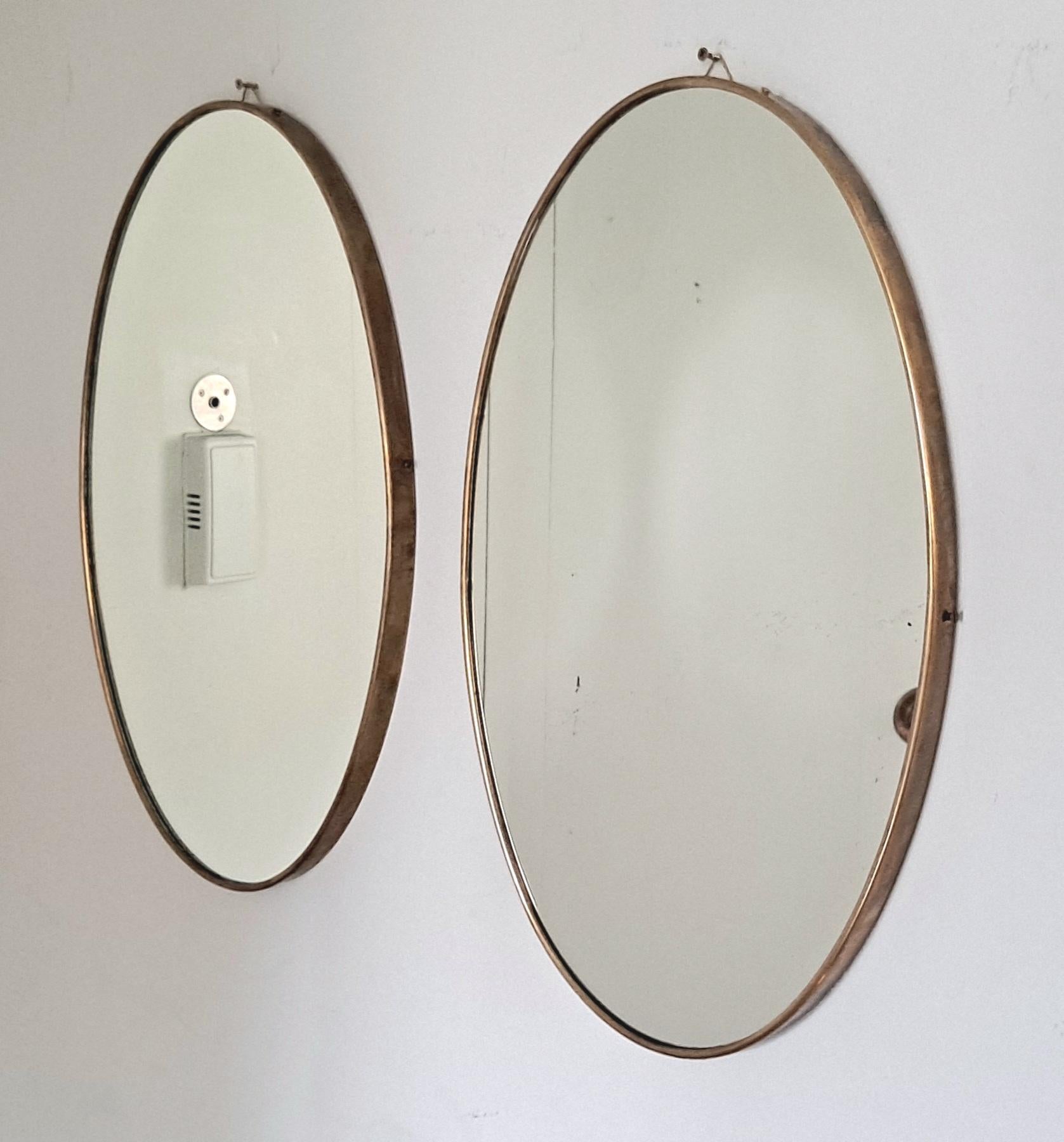 Italian mid century brass mirrors for the wall. Tarnish bras in original condition.
 