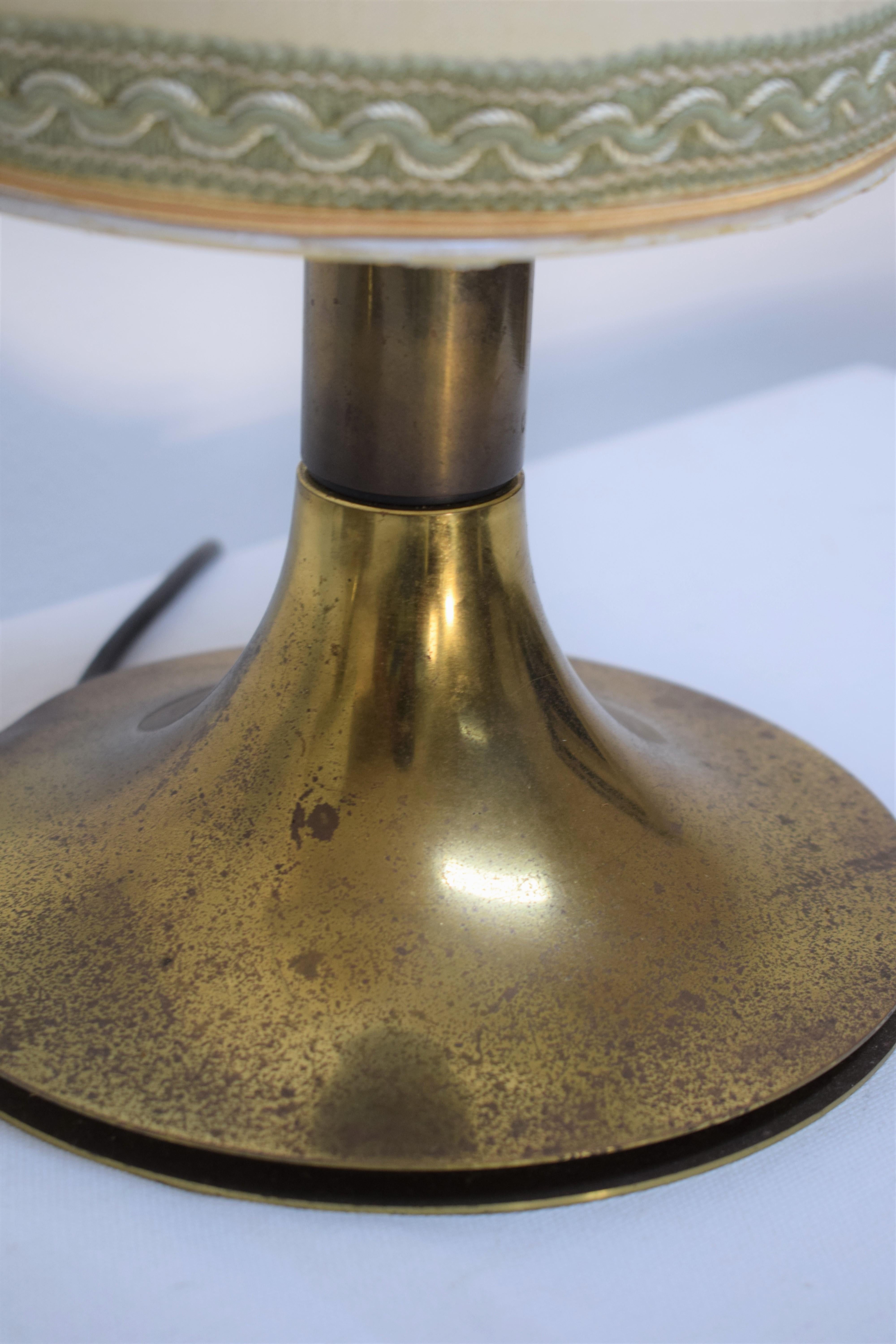 Pair of Italian brass table lamps, 1960s.
Dimensions: H= 35cm; D= 20 cm.