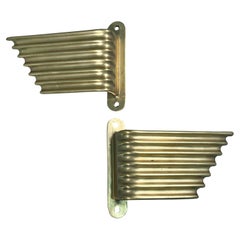 Coppia di maniglie per porte a forma di ala in ottone italiano