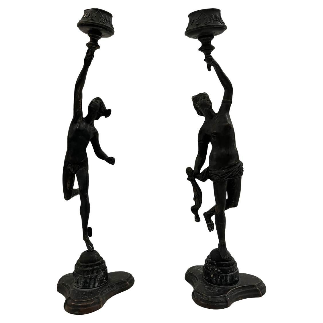 Pareja de candeleros italianos de bronce