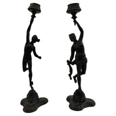 Pareja de candeleros italianos de bronce