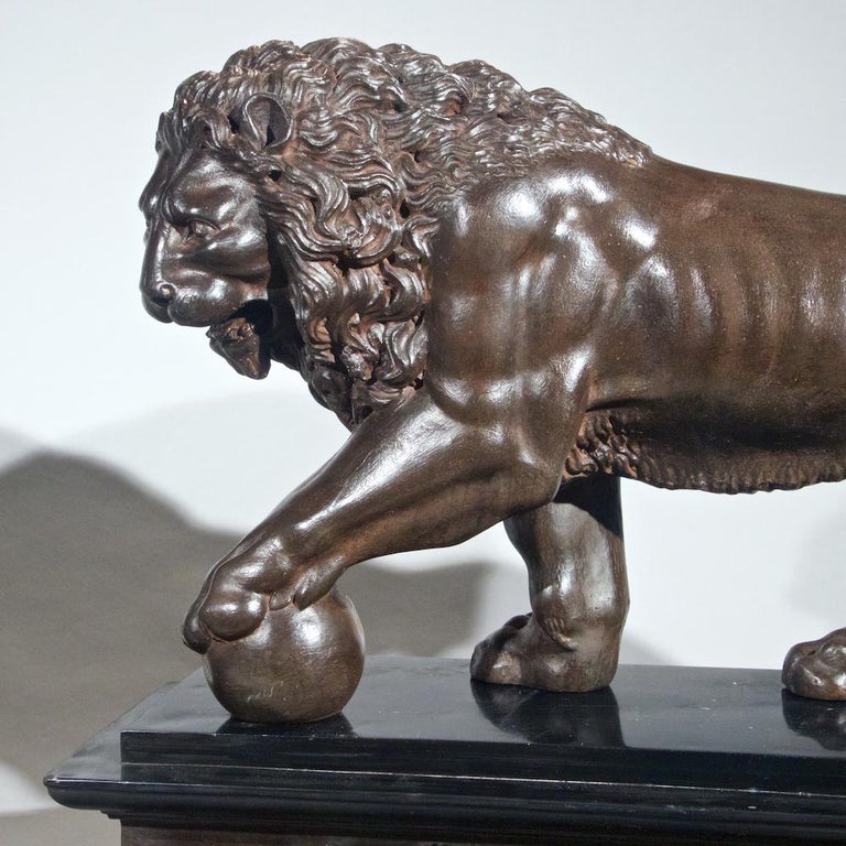 Pair of unusually large Italian  Grand Tour composition  lions on simulated marble bases.