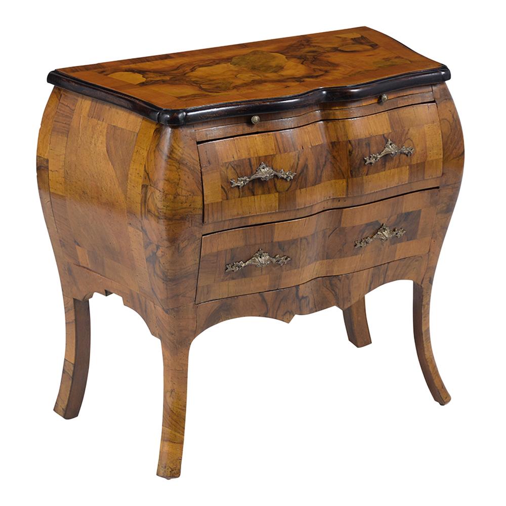 A Remarkable Pair of 1930s Italian Chest of Drawers crafted from solid maple wood covered with burl walnut veneers and a newly waxed patina finish. These eye-catching bedside tables have been professionally restored, features its original finish,