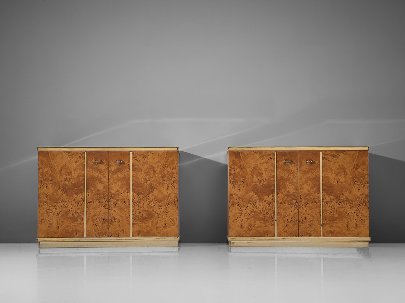Pair of small sideboards, mappa burl wood and brass, Italy, circa 1960.

Luxurious small sideboards in the style of Jean Claude Mahey. The admirable mappa burl wood veneer gives these sideboards a nice and warm appearance in combination with the