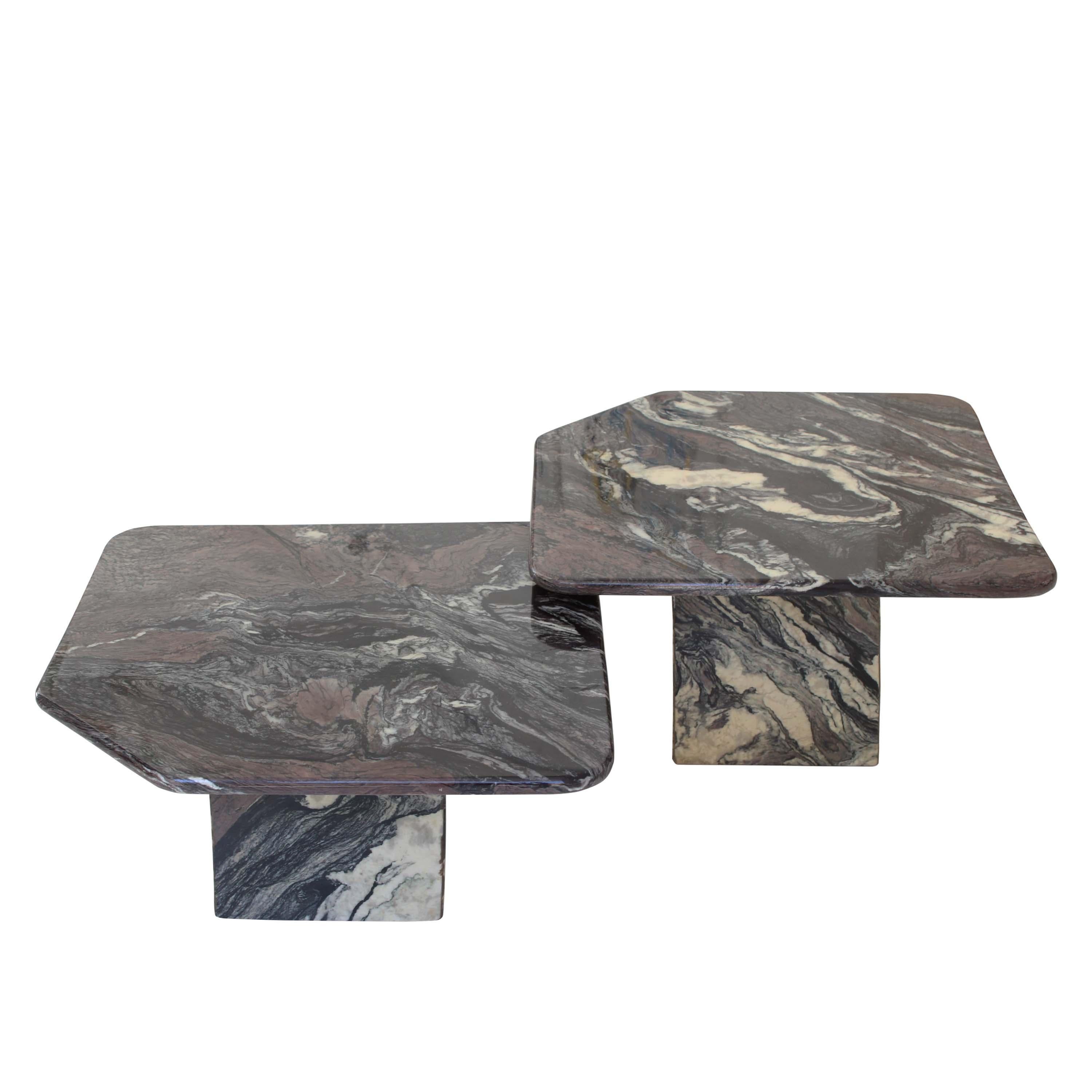 Pair of sculptural coffee tables crafted in Italy in the 1970s from Calacatta Cipollino marble. Their geometric design features clean lines and softly rounded edges that enhance the organic, flowing character of the stone. The striking veining in