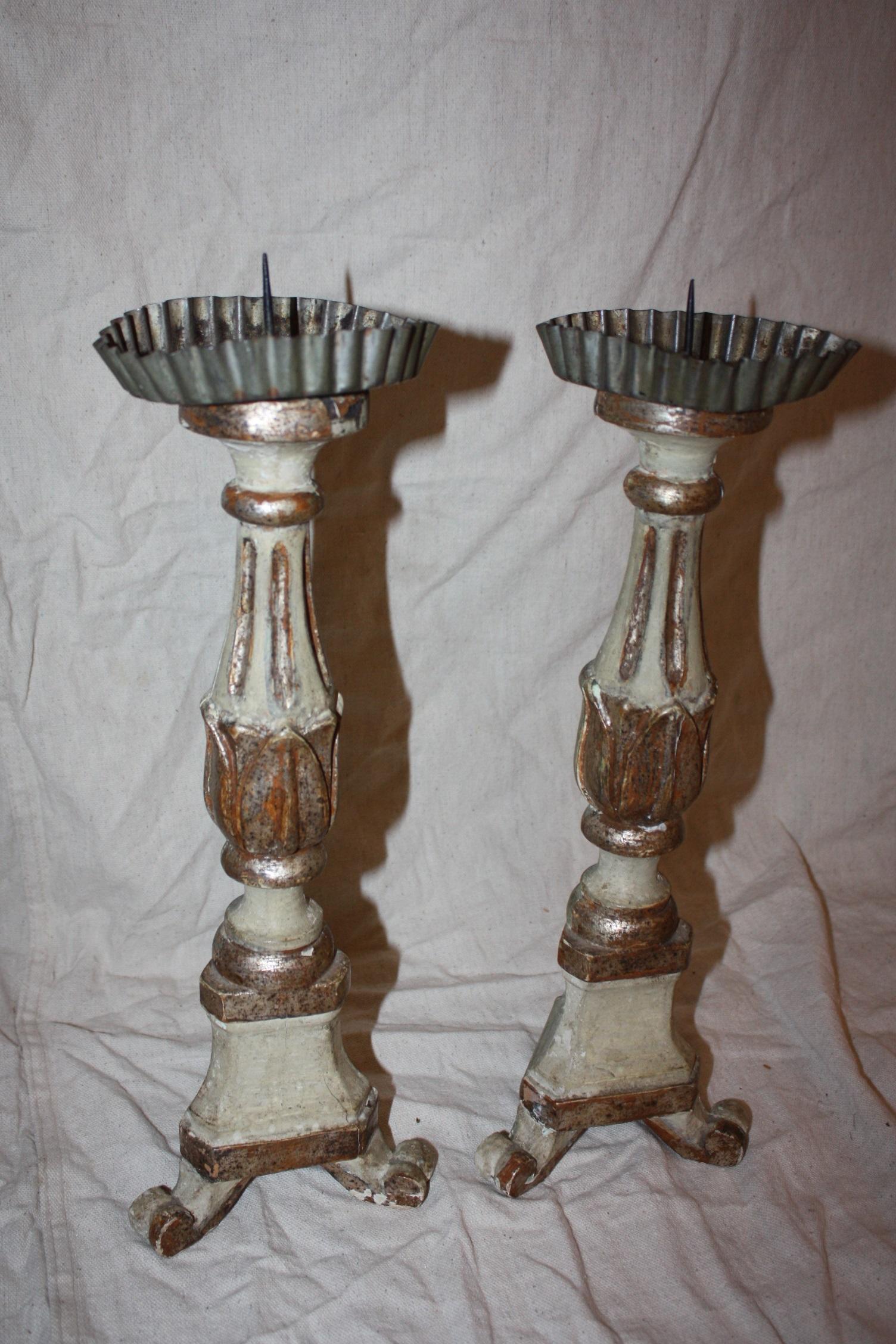 This is a great looking pair of tall Italian candlesticks dating to the early 1800s.

The height is 16