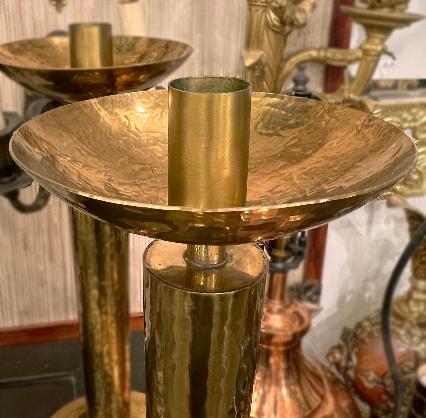 A pair of circa 1920's Italian gilt metal candlesticks with hammered finish.

Measurements:
Height: 15.5?
Diameter: 6? (widest point).