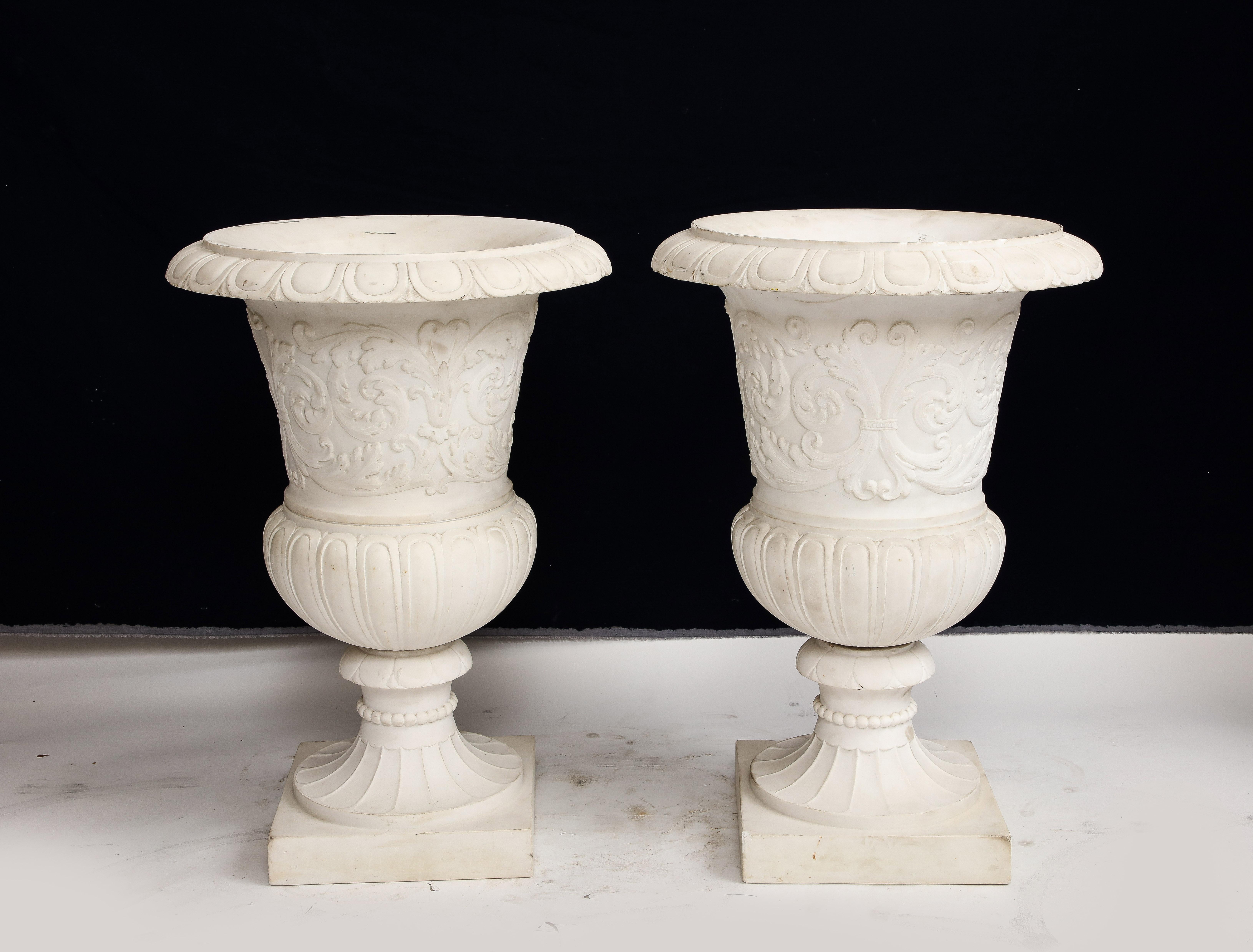 Late 19th Century Pair of Italian Carrara Marble Medici Vases w/ Neoclassical Motifs in Relief For Sale