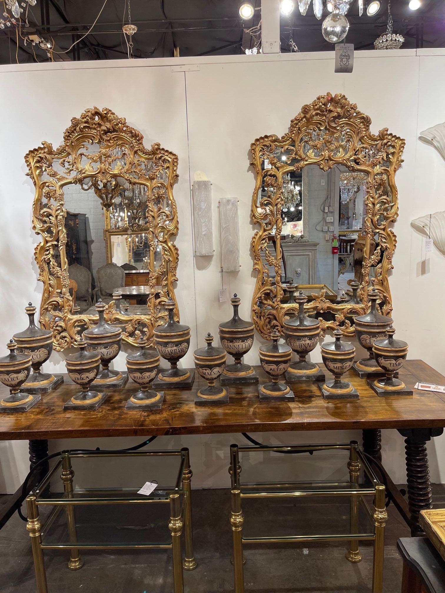 Gorgeous pair of Italian carved and giltwood mirrors. Very fine ornate carvings on these. A fabulous decorative element for a fine home! Note: 9800 for the pair