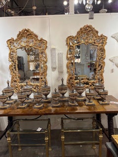 Pair of Italian Carved and Giltwood Mirrors