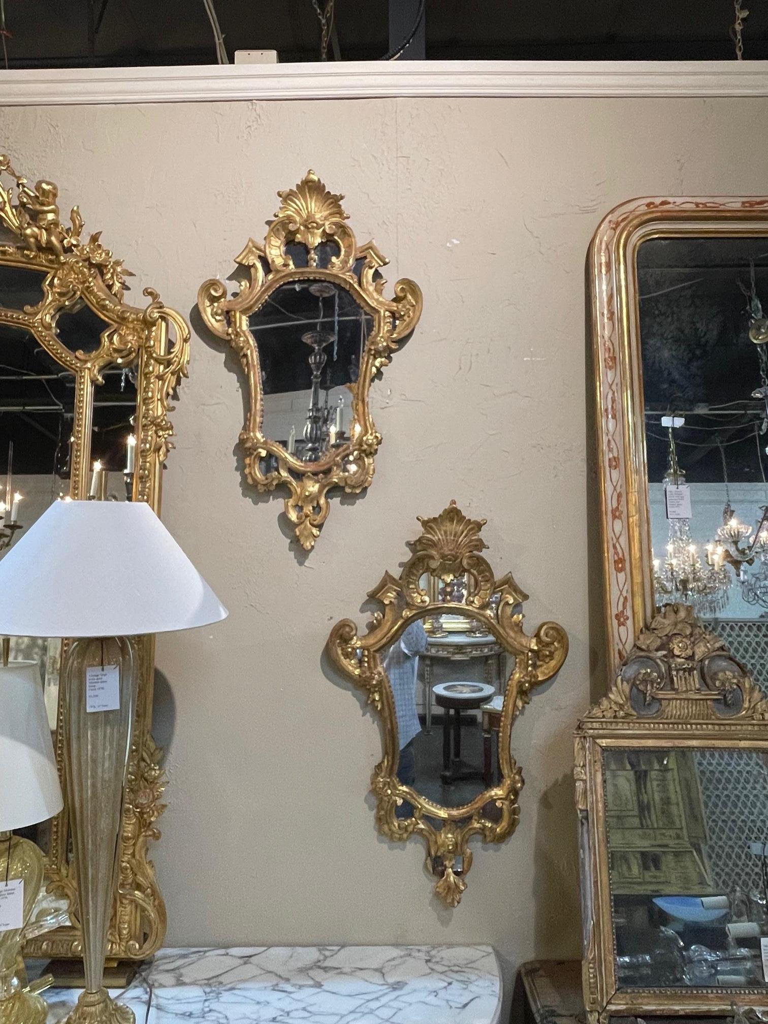 Mid-19th Century Pair of Italian Carved and Giltwood Mirrors