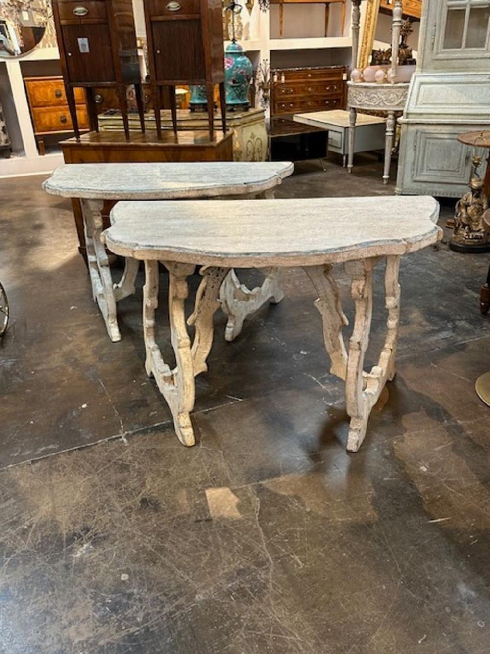 Lovely pair of carved and painted consoles from Tuscany. Beautiful accent pieces for a fine home. Nice!