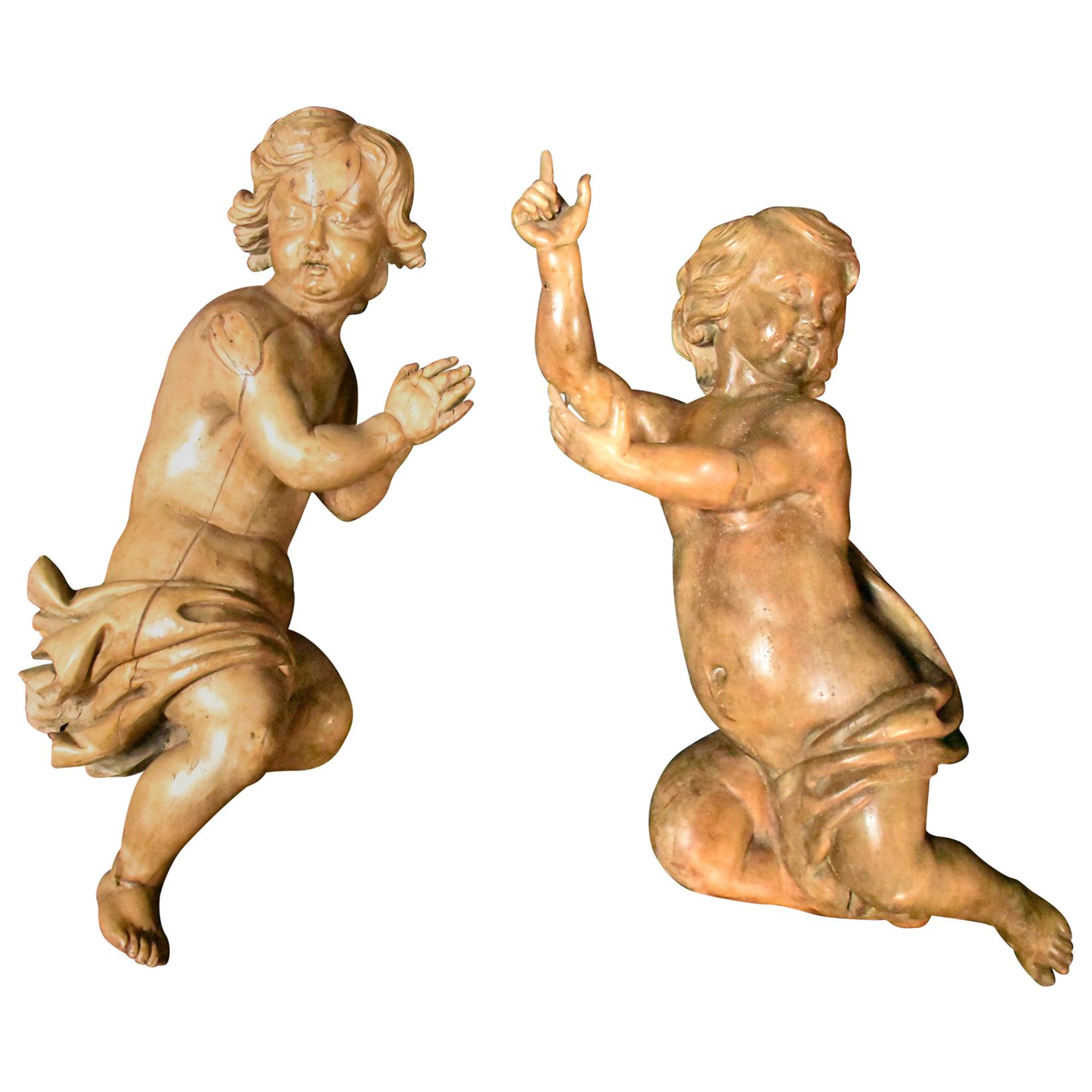 Pair of Italian Carved Fruitwood Figures of Putti, 18th Century