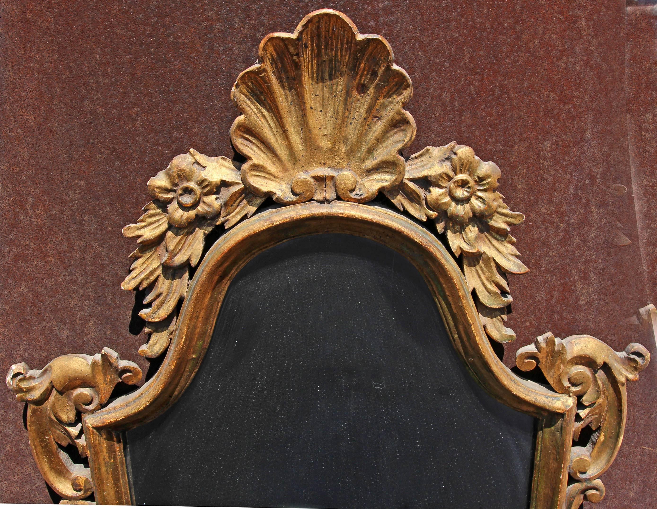 Pair of 20th century Italian carved giltwood mirrors.

