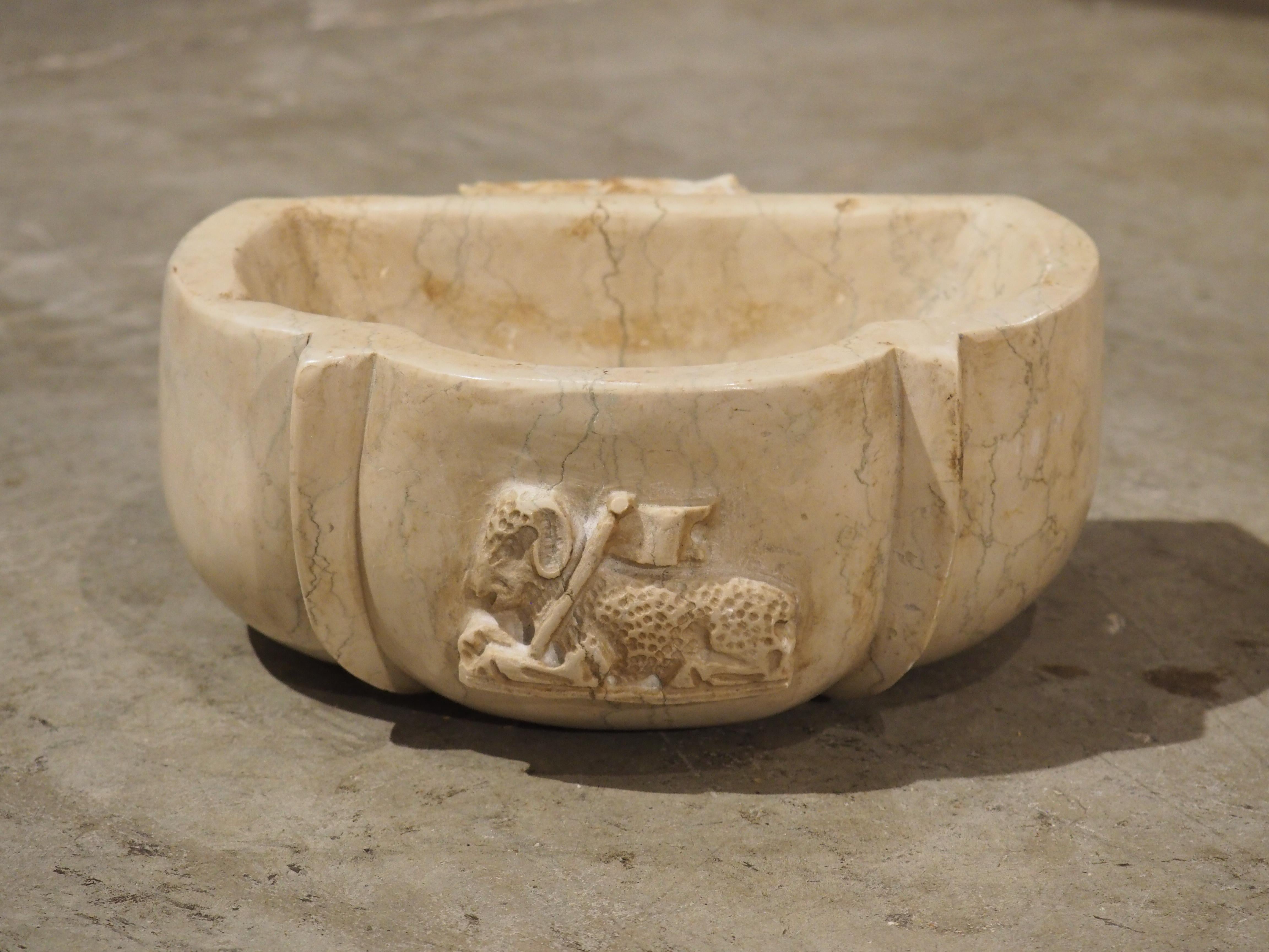 Pair of Italian Carved Marble Stoups with Relief of The Paschal Lamb In Good Condition For Sale In Dallas, TX