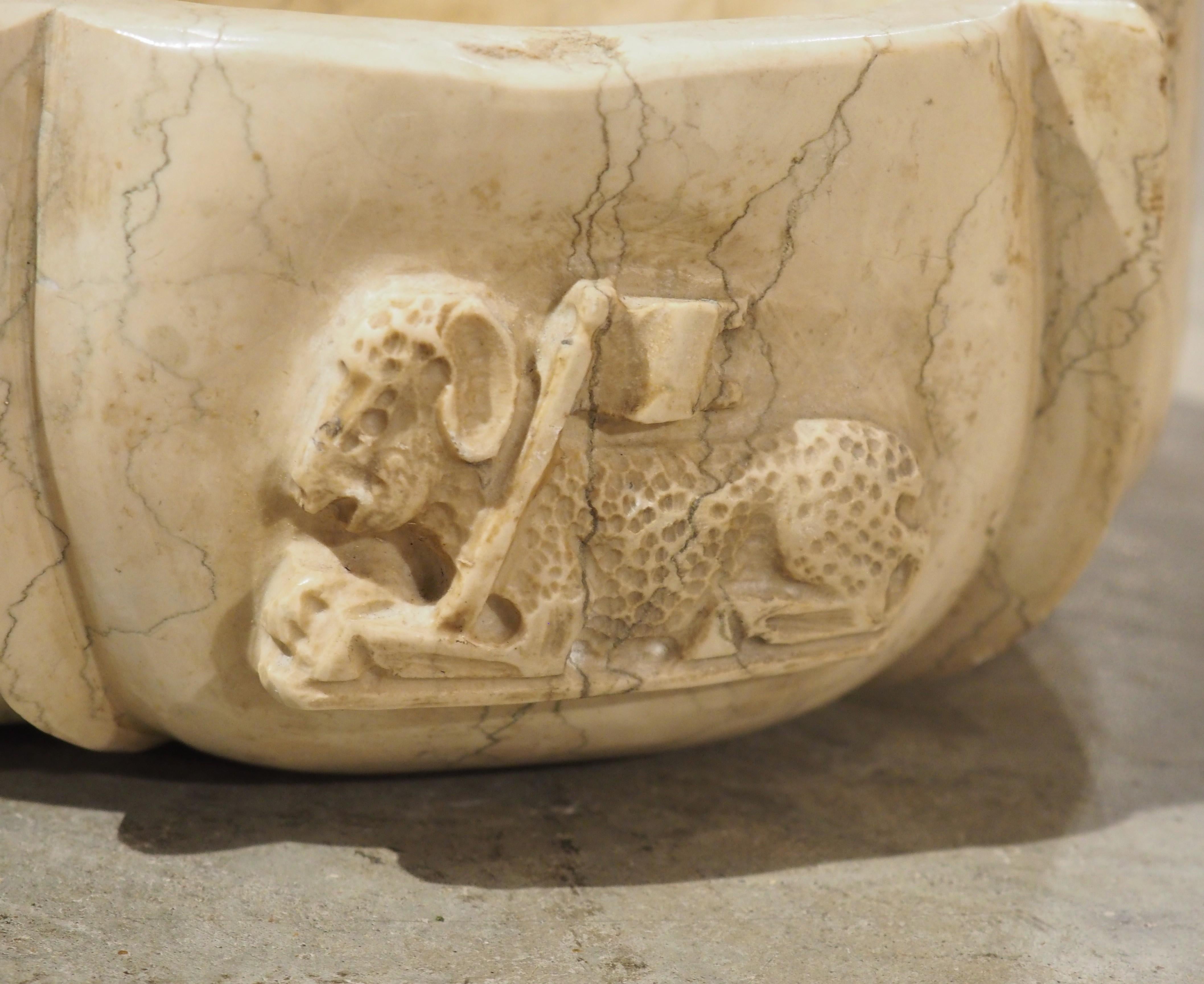 Contemporary Pair of Italian Carved Marble Stoups with Relief of The Paschal Lamb For Sale