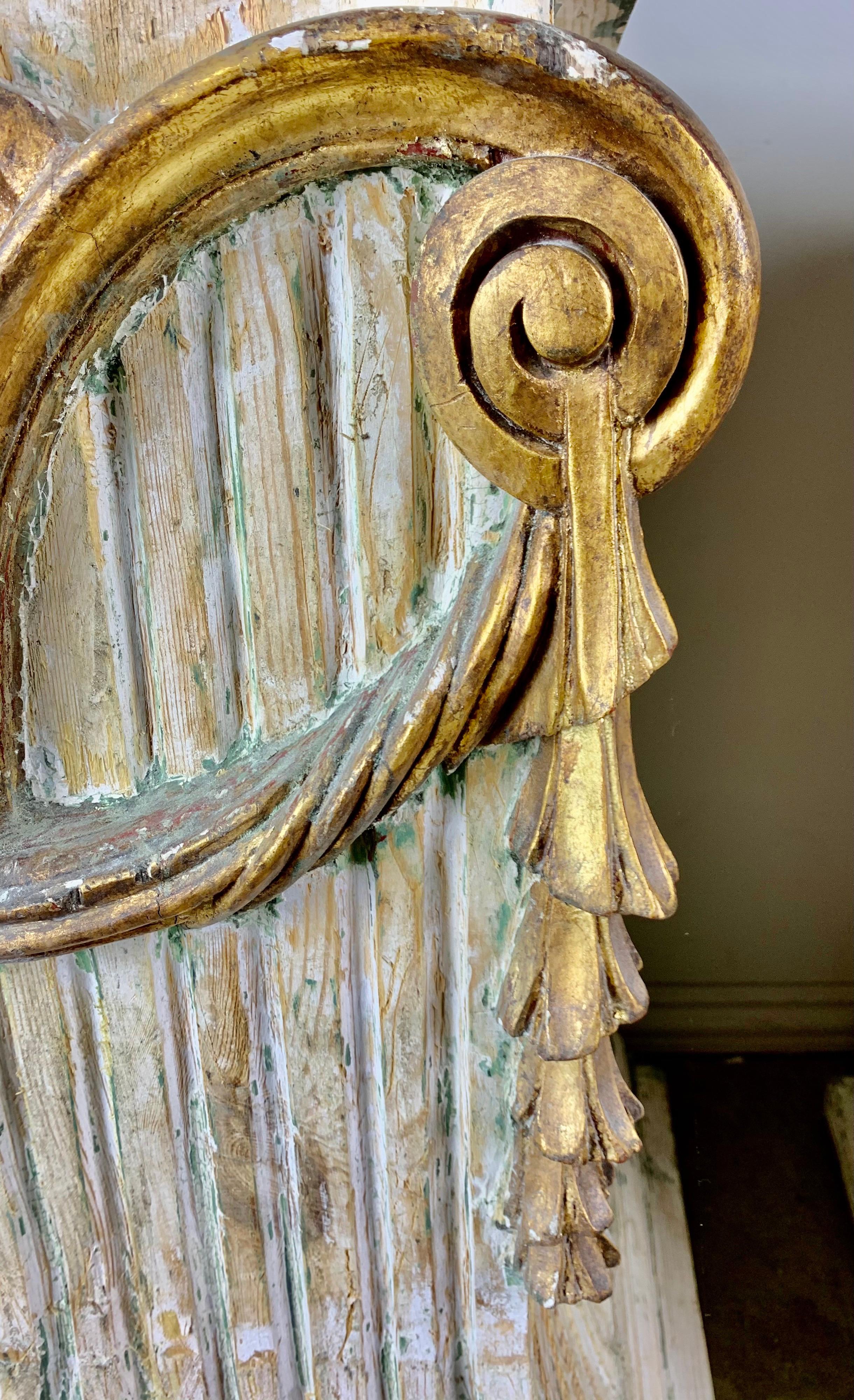 Pair of Italian Carved Painted and Parcel Gilt Pedestals 1