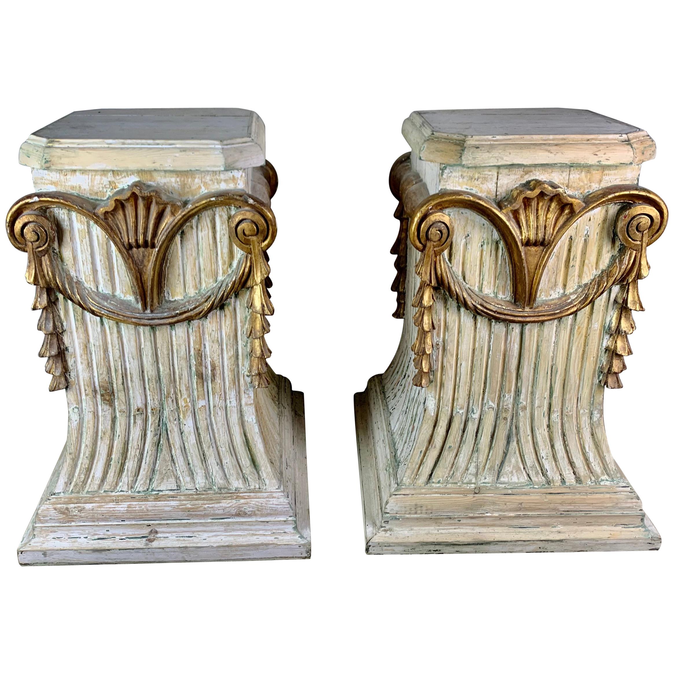 Pair of Italian Carved Painted and Parcel Gilt Pedestals