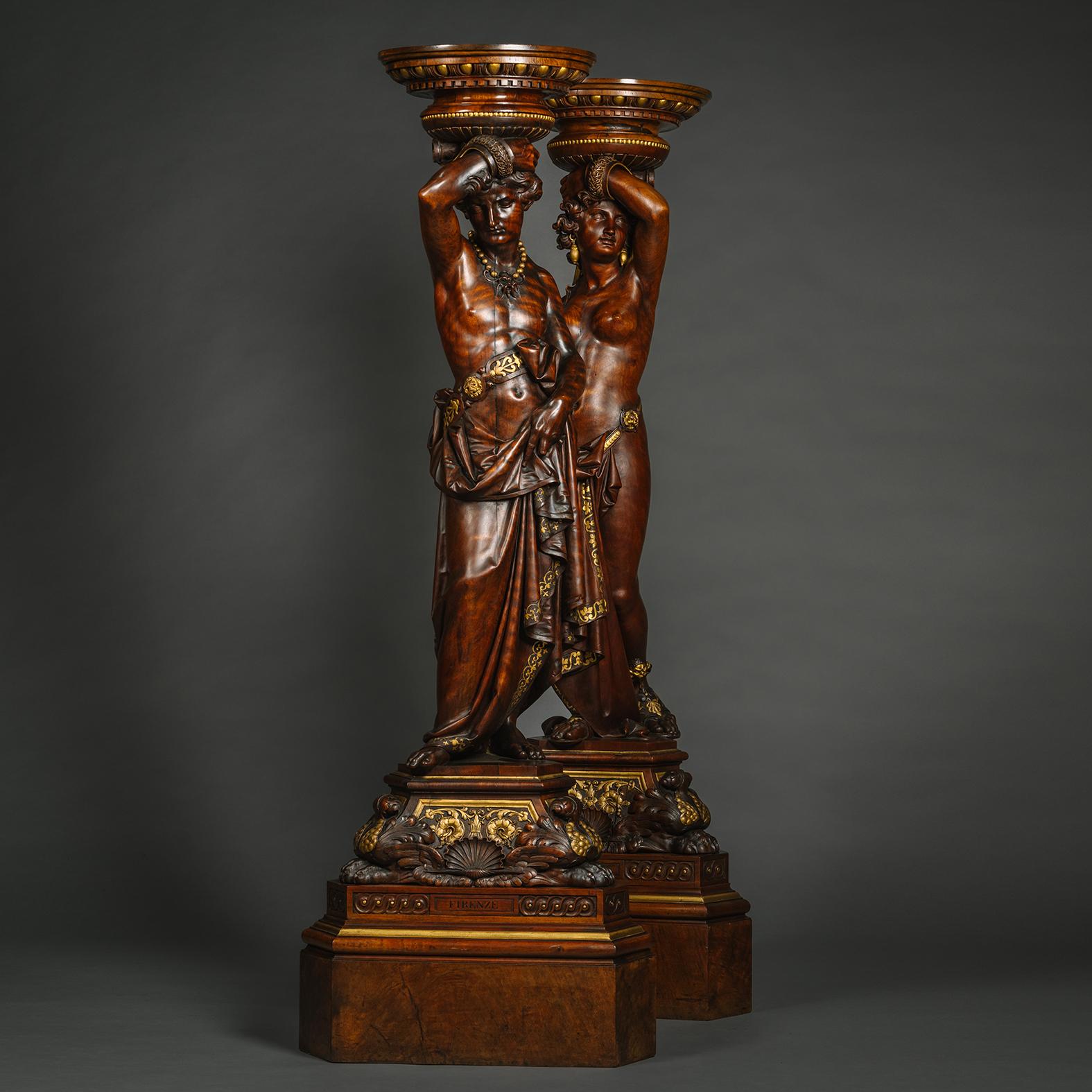 Pair of Italian Carved Walnut and Parcel Gilt Figural Torchères  For Sale 1
