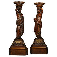 Antique Pair of Italian Carved Walnut and Parcel Gilt Figural Torchères 