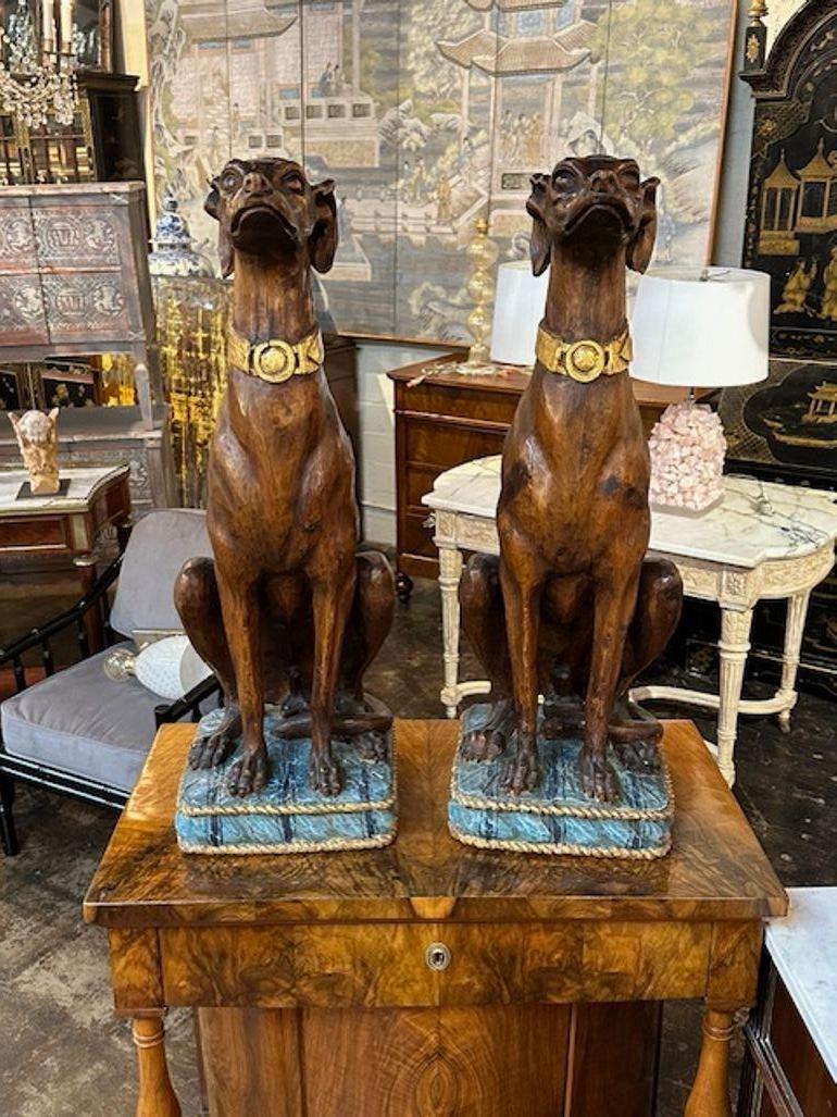 Handsome pair of Italian carved Whippets. Very fine craftsmanship!