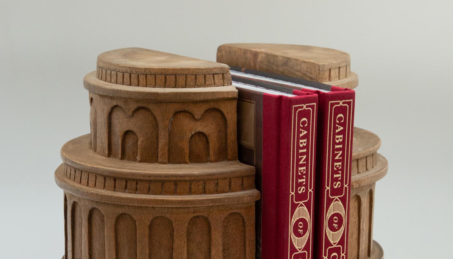 Pair of Italian carved wood architectural bookends. Halved coliseum 11