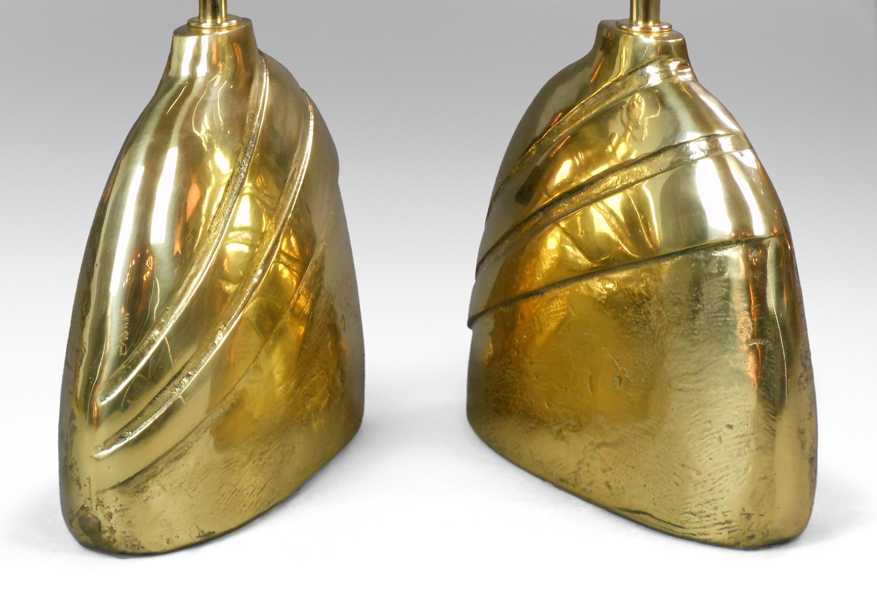 Pair of Italian Oval Cast Brass Lamps. Signed

One can never be too thin or too brassy! Gorgeous lamps combining great sophistication and simplicity with a soft patina. Each of compressed bell form with deeply incised diagonal lines.

Height to