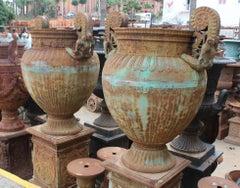 Pair of Italian Cast Iron Urns with Women and Lions Handles