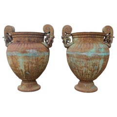 Pair of Italian Cast Iron Urns with Women and Lions Handles