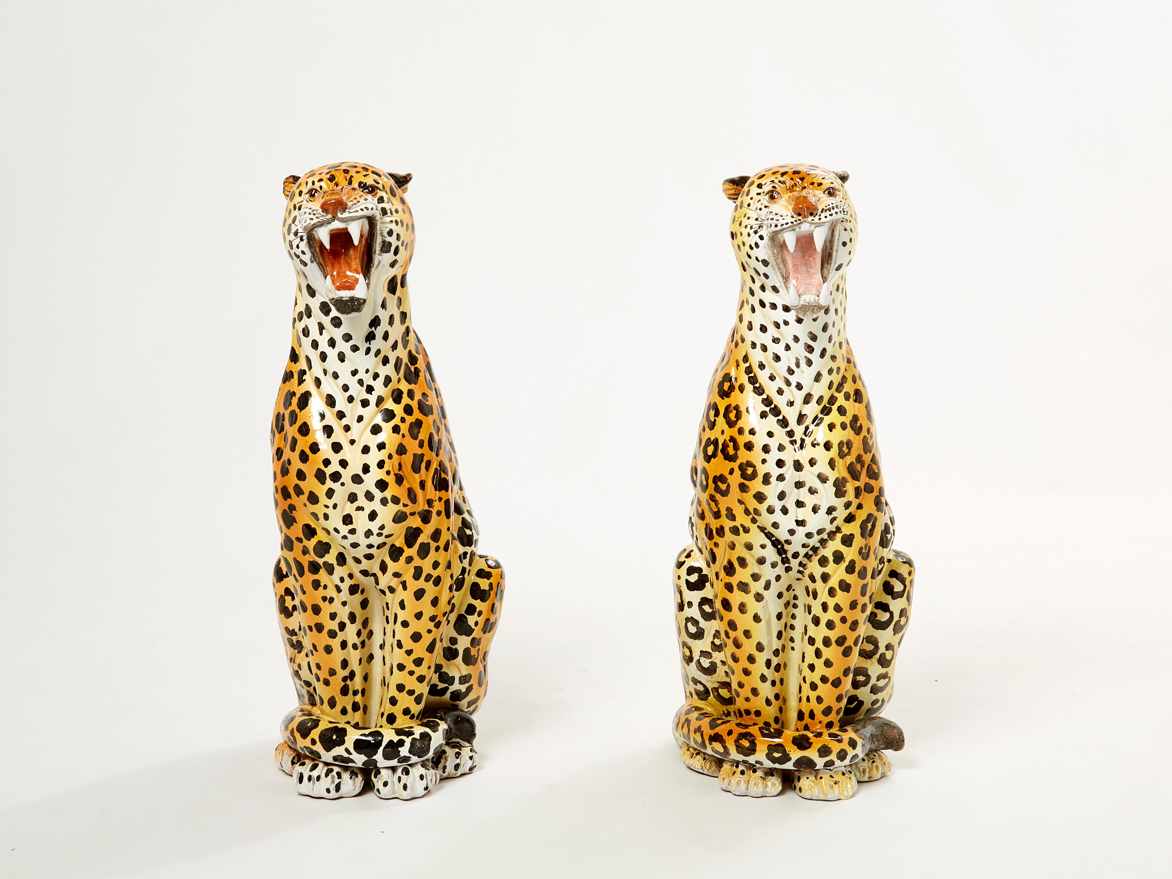This is a beautiful set of vintage Italian glazed ceramic leopards, male and female, made in Italy in the 1960s. The two sculptures are large and life-size, and are in very good vintage condition, with a lovely patina on them. They were