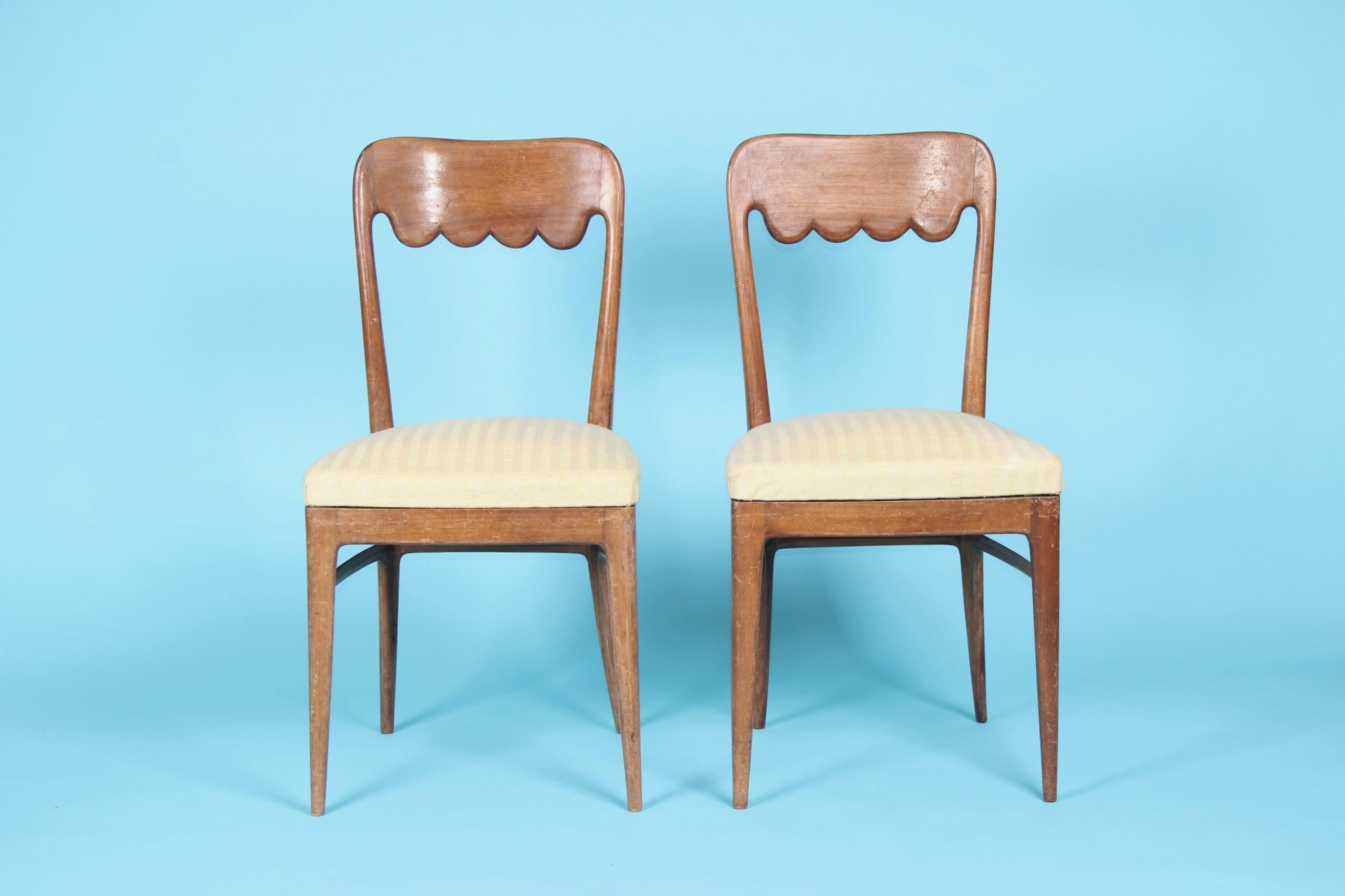 Pair of Italian chairs, some scratches on the wood.