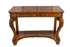 Coppia di consolle in legno di noce del XIX secolo Charles X con grandi volute intagliate