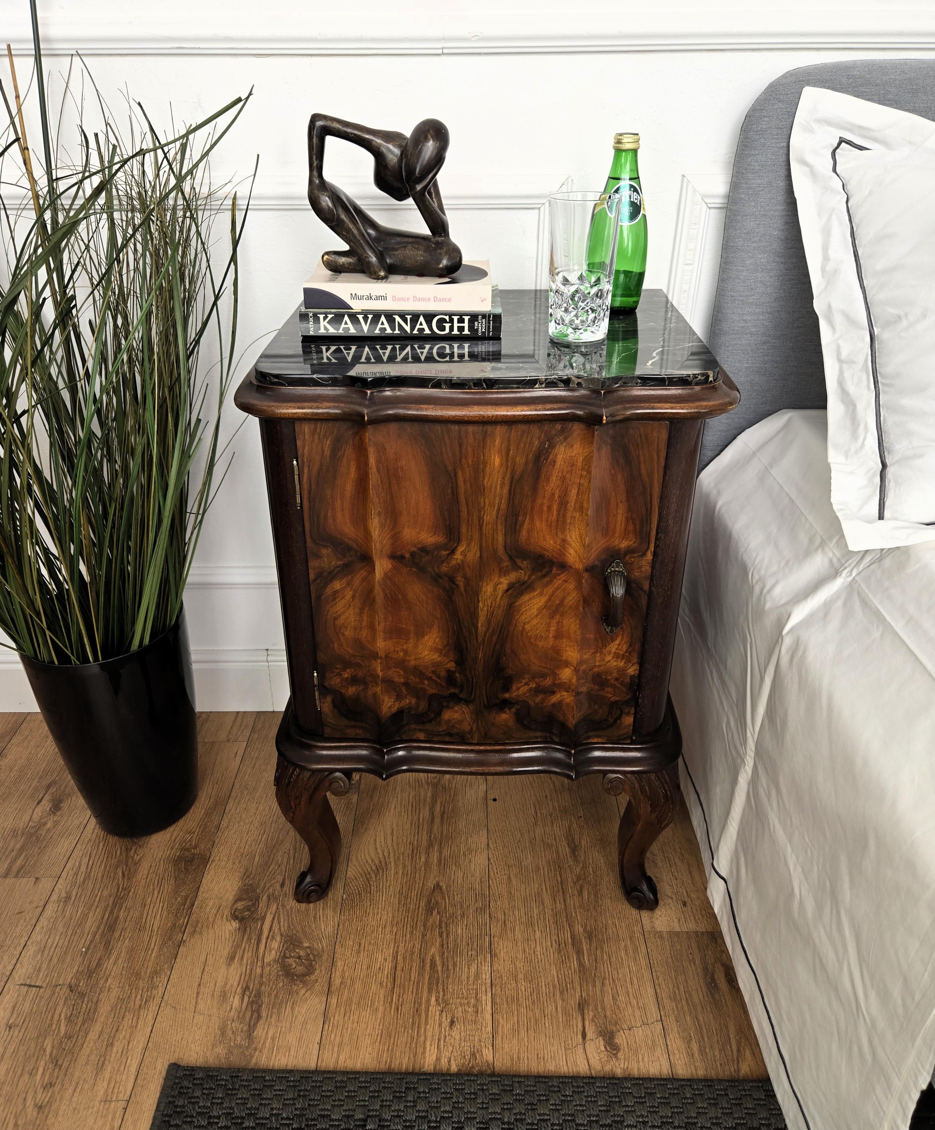 Pair of lovely antique Italian night stands or side tables with greatly carved doors and drawers and Portoro marble top. Portoro is a high-quality black marble, where the vast crystalline black of its base is furrowed by a spectacular burst of