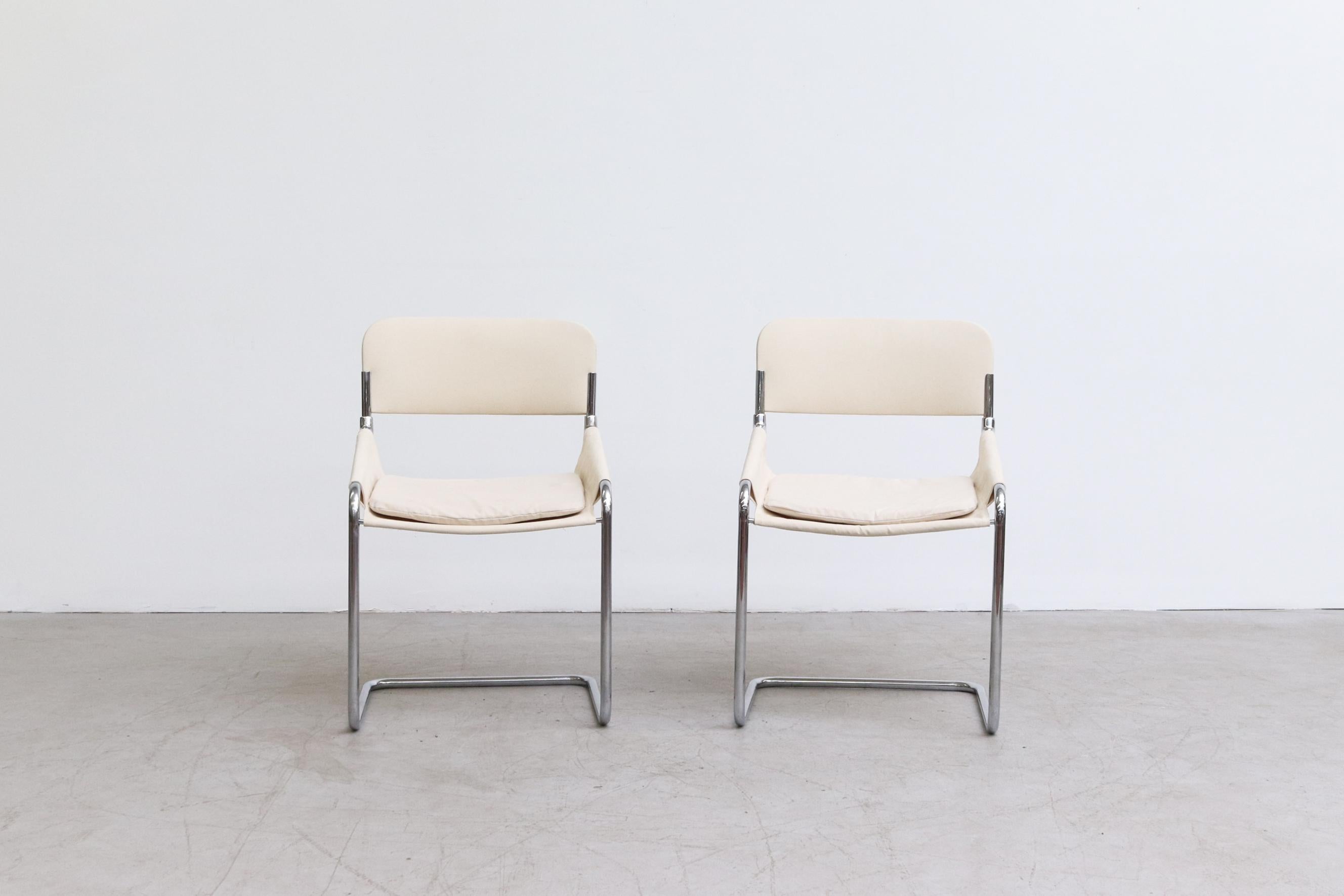 Handsome pair of Italian chrome and canvas chairs with tubular chrome cantilevered frame. Newly upholstered fabric, original frames. Set price.