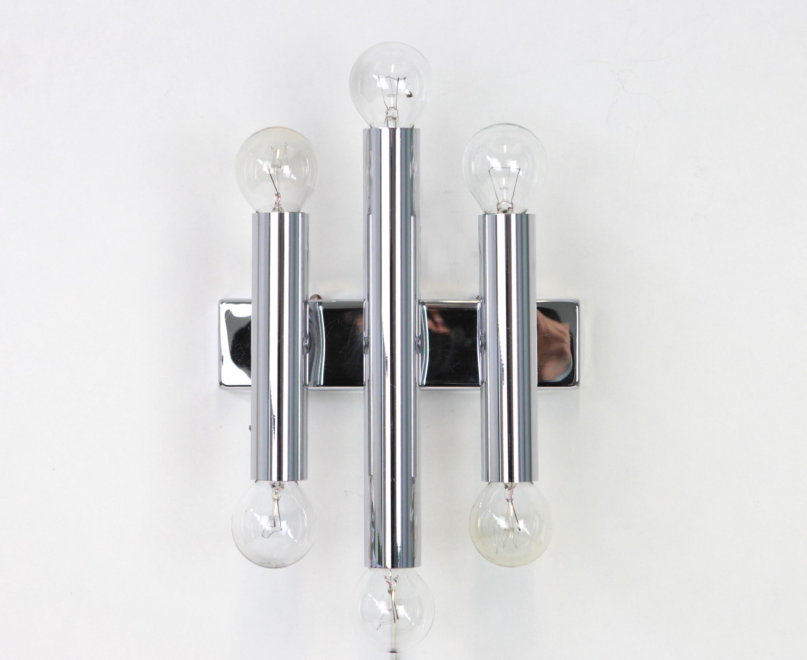 Pair of Italian chrome wall sconces Sciolari style, 1970s
each wall light needs 6 x E14 small bulb.
Dimensions:
Height approximate 23 cm
Width 20 cm
Depth 10 cm
Good condition.
Please note that the listed price is for the pair.
  
