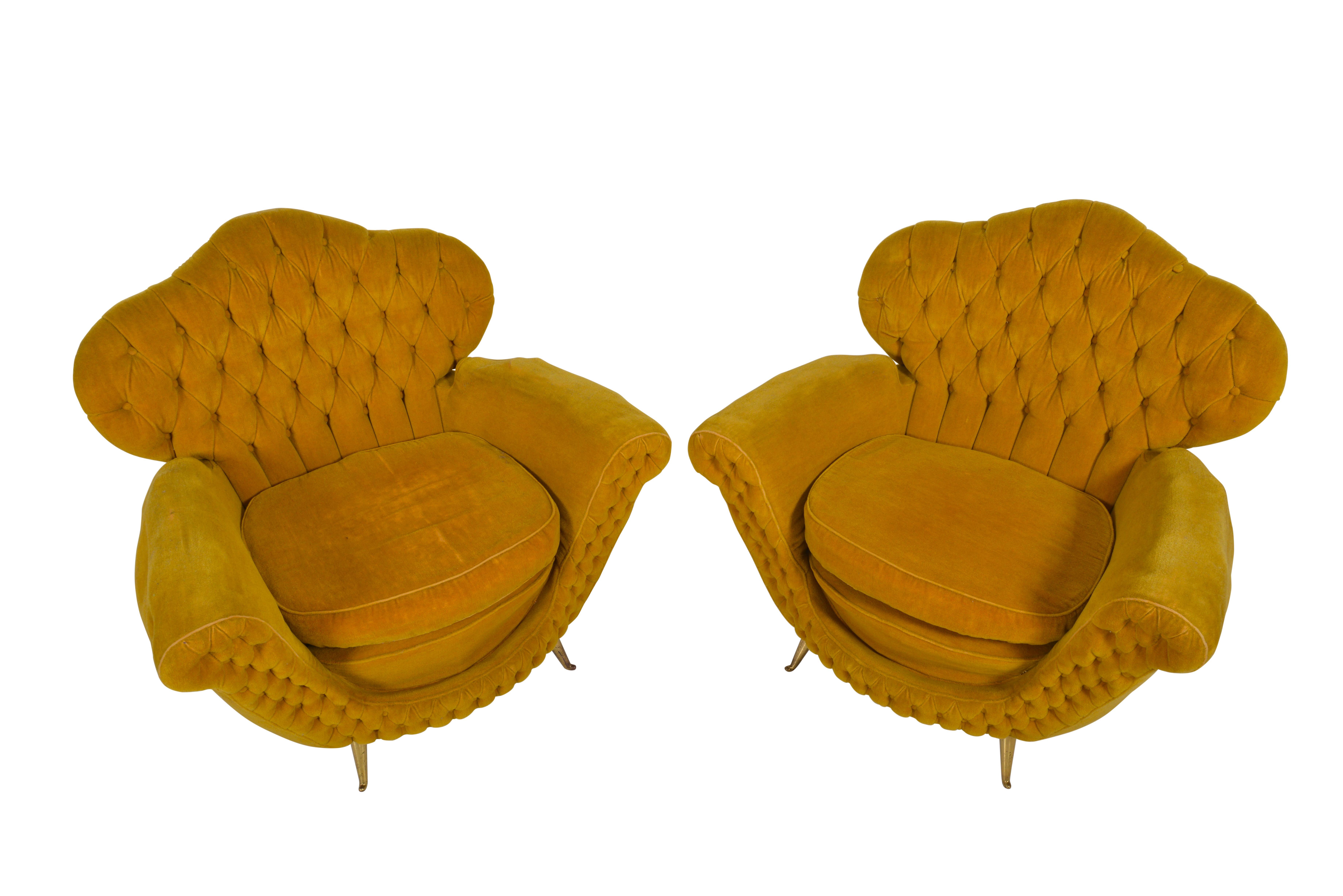 Most elegant and sinuously curved pair of Italian midcentury club chairs. Original button tufted gold colored mohair fabric. On copper legs.
