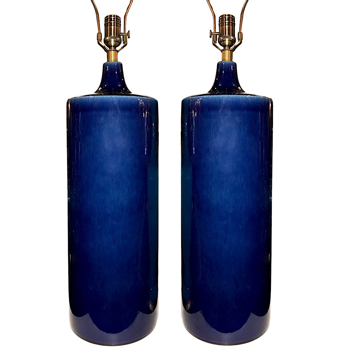 A pair of Italian circa 1960's cobalt blue glazed porcelain table lamps.

Measurements:
Height of body: 22.5