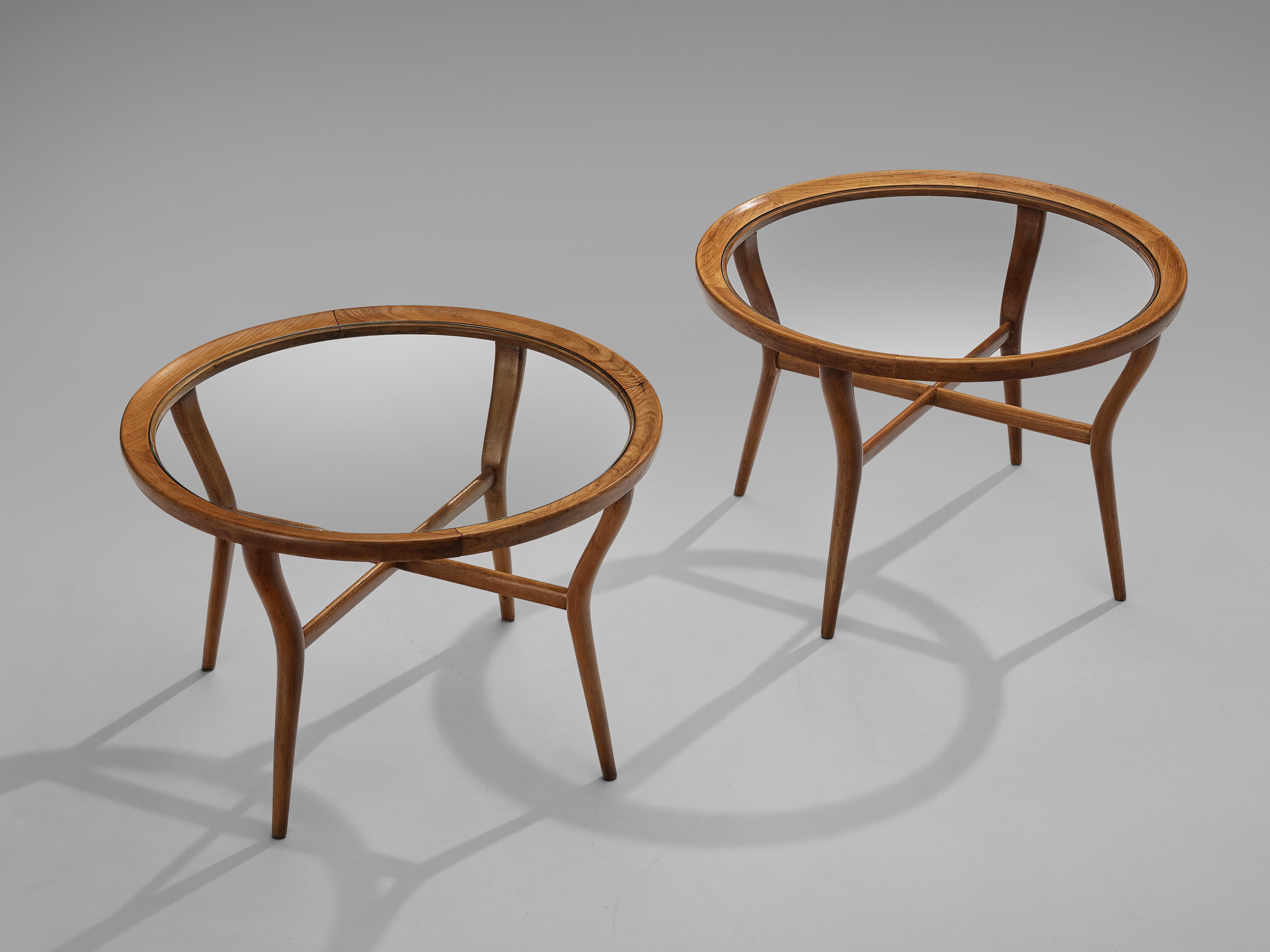 Coffee tables, cherrywood, glass, Italy, 1950s

Beautiful round Italian coffee tables in cherrywood and a glass tablet op. Although the design is simplistic, due to the combination of materials the piece still has a great character. Thanks to the