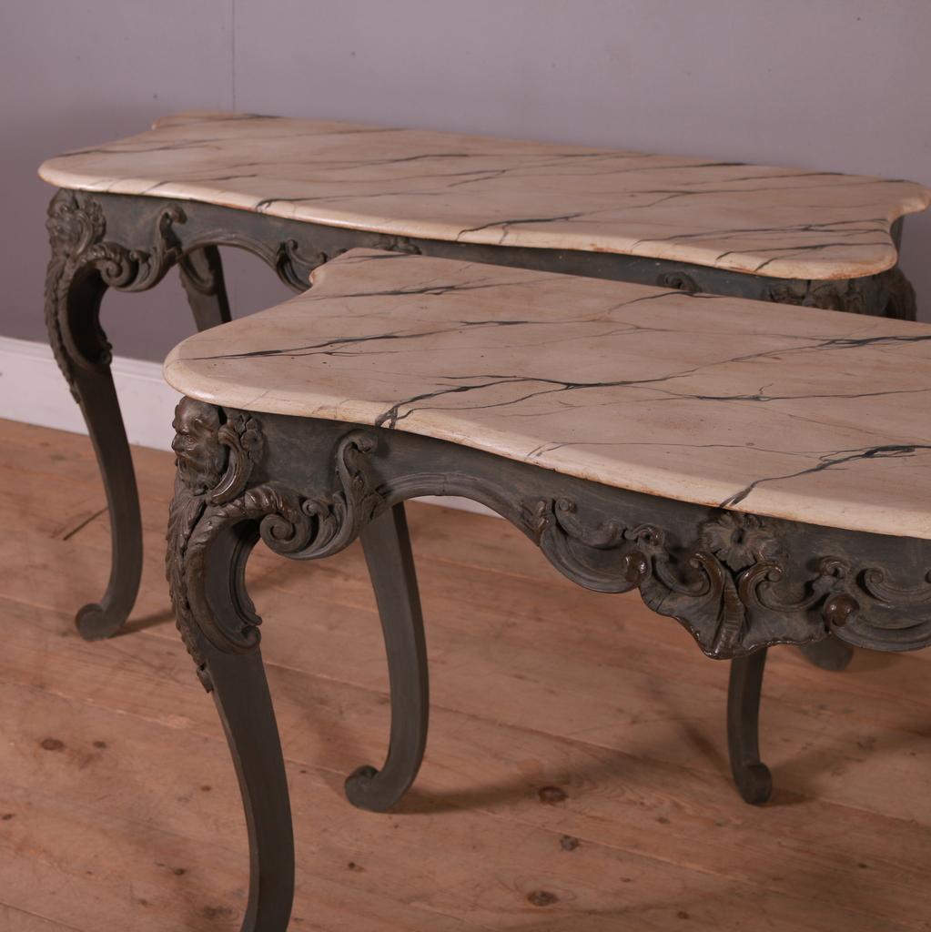 Wonderful pair of 19th C Italian painted console tables with faux marble tops. 1860.

  

Dimensions
45 inches (114 cms) wide
20.5 inches (52 cms) deep
29.5 inches (75 cms) high.