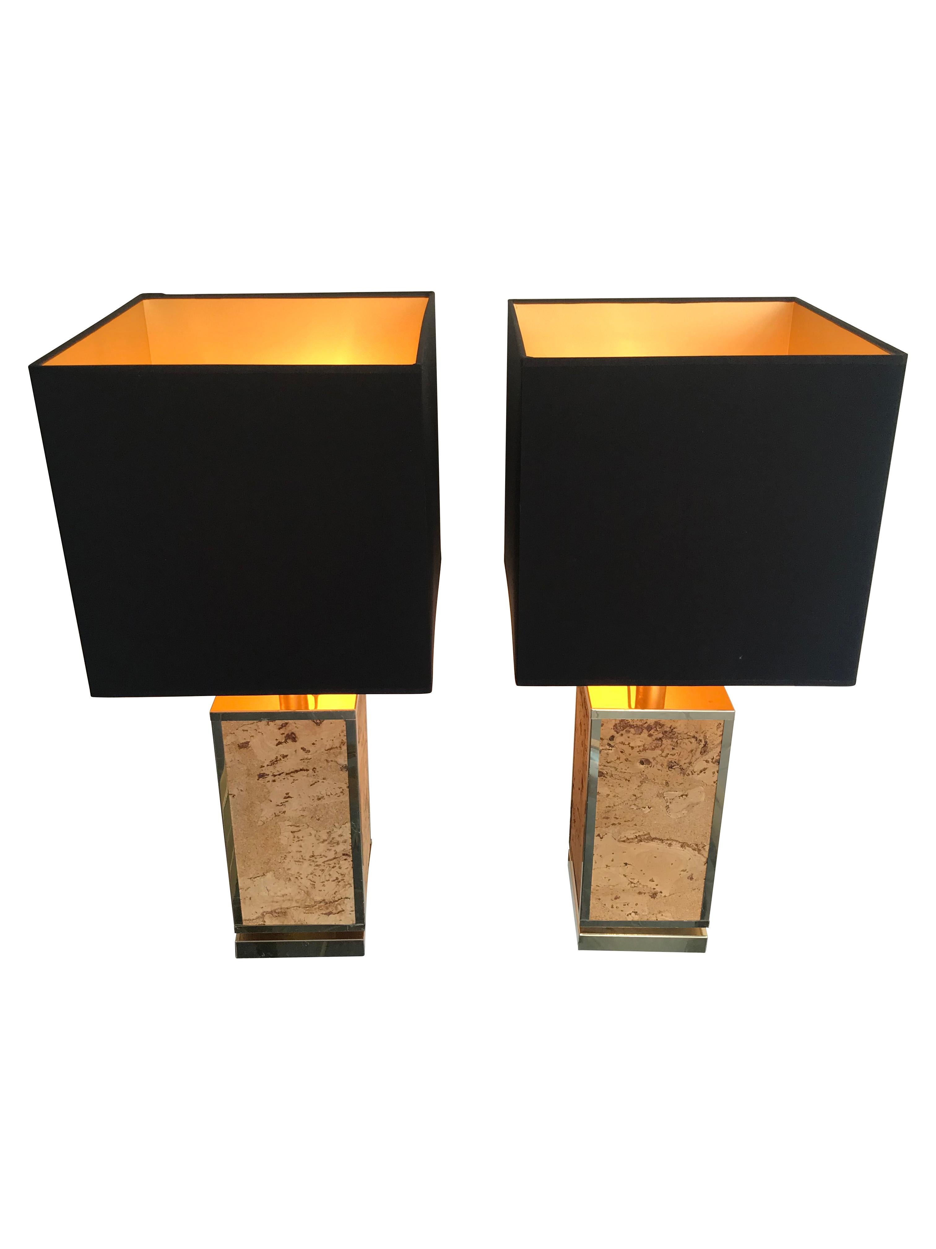 A pair of Italian lamps with cork inlay and gilt metal base and finish. With new bespoke black shades with gold linings. Re wired with new fittings and antique gold cord flex and PAT tested.