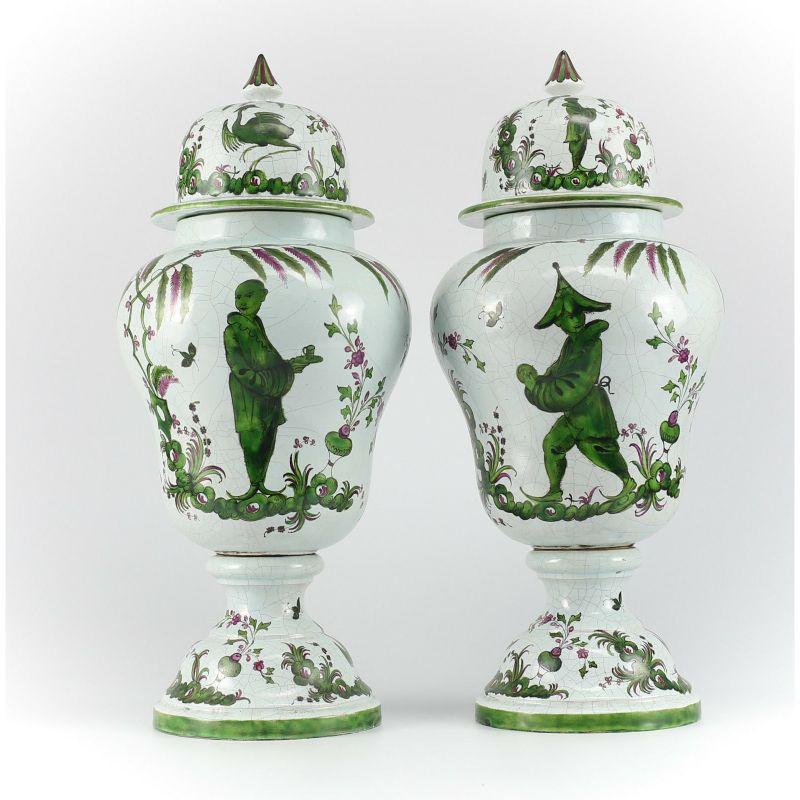 Pair of Italian Craquelure ceramic lidded Urn, Beautifully Hand painted Floral, Foliate and figural Chinoiserie designs in tones of blue, green, & purple. Overall crazed details. Unmarked. 

Additional information:
Production Technique: Pottery