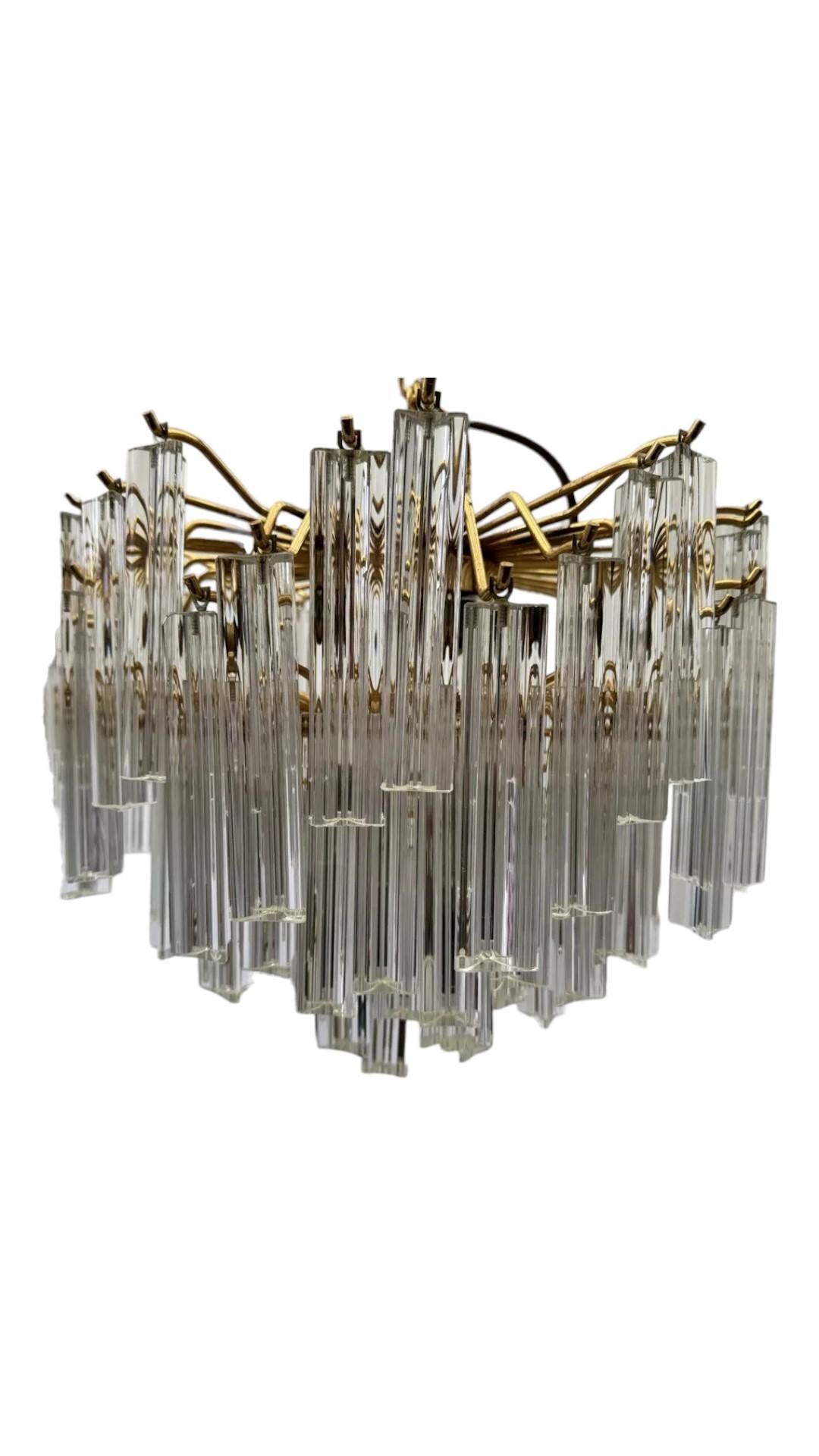 A Pair of C1960s Cascading Crystal Chandeliers in the Style of Venini
These chandeliers are absolutely Stunning and of good Size
Each Chandelier has 101 Crystal Prism Drops
These Chandeliers have been Rewired and Cleaned
