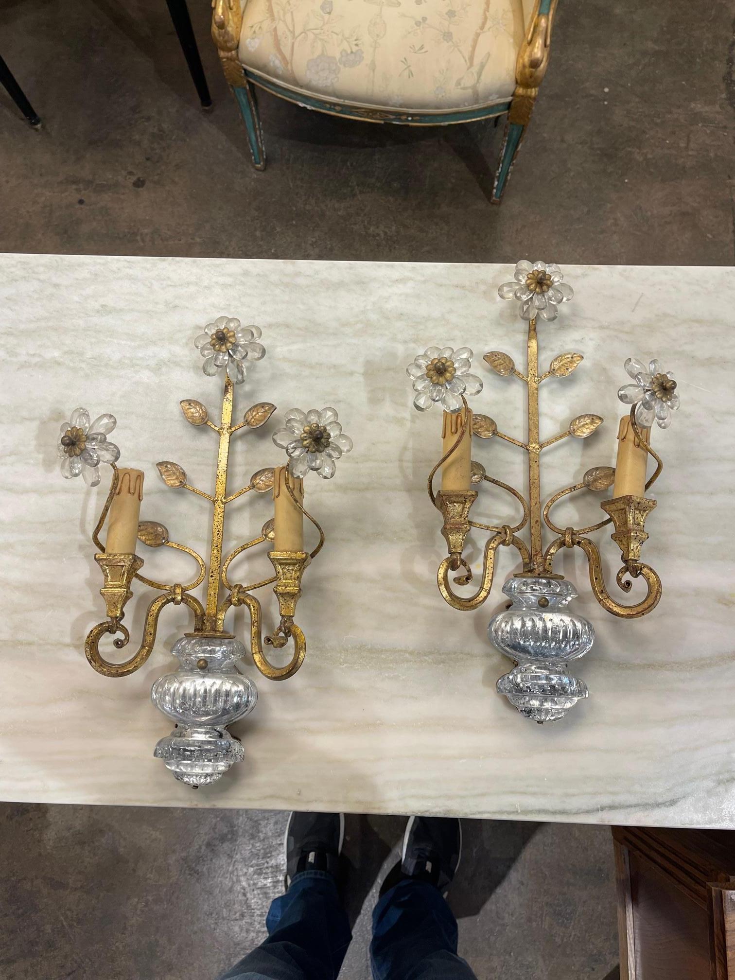 Pair of vintage Italian Bagues style gilt iron crystal flower sconces, Circa 1940. The sconces are wired and ready to hang. Sure to make a statement.
