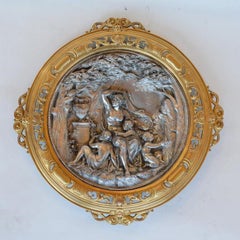 Pair of Italian Deep Relief Figural Metal Wall Plaques, Late 19th Century.