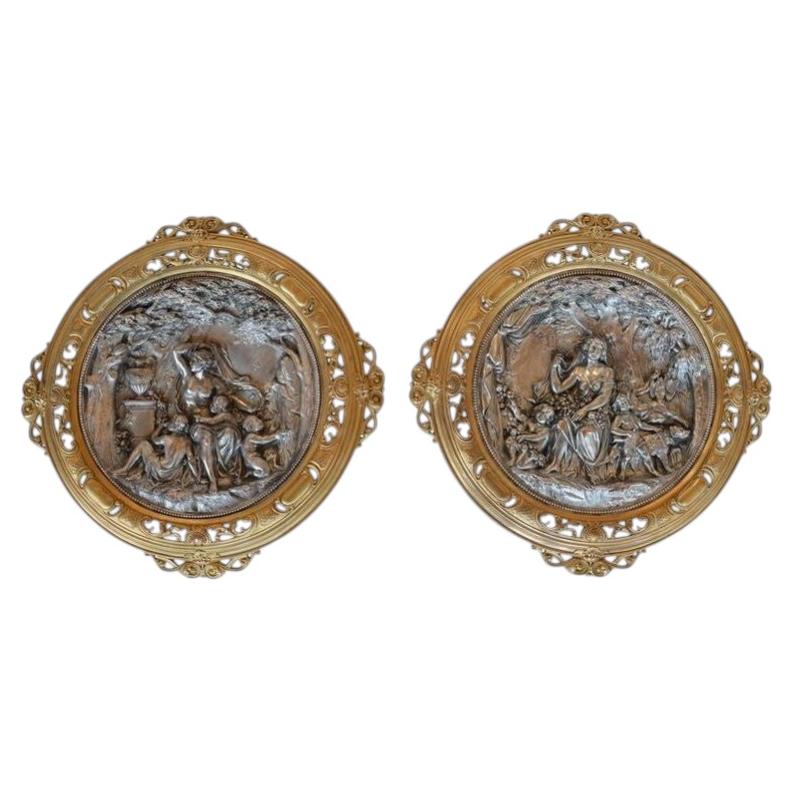 Pair of Italian Deep Relief Figural Metal Wall Plaques, Late 19th Century.