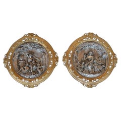 Pair of Italian Deep Relief Figural Metal Wall Plaques, Late 19th Century.
